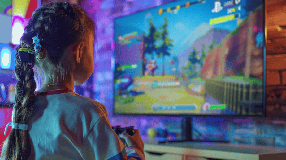 Jugadora de videojuegos en consola jugando un popular juego en una pantalla de alta definición en un entorno colorido y moderno.