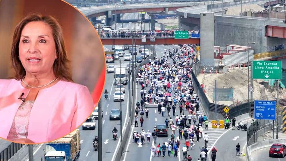 Congestión vehicular y marcha masiva en la vía expresa Línea Amarilla en Lima, Perú, generando retrasos y caos en el tránsito.